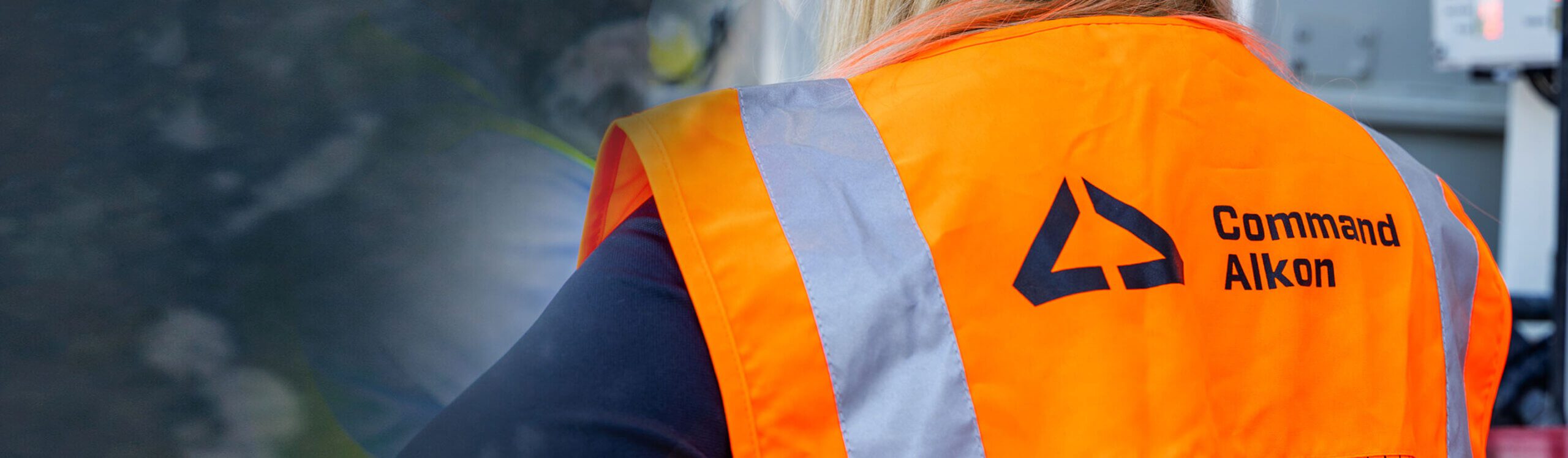 back of high vis vest with command alton logo on it